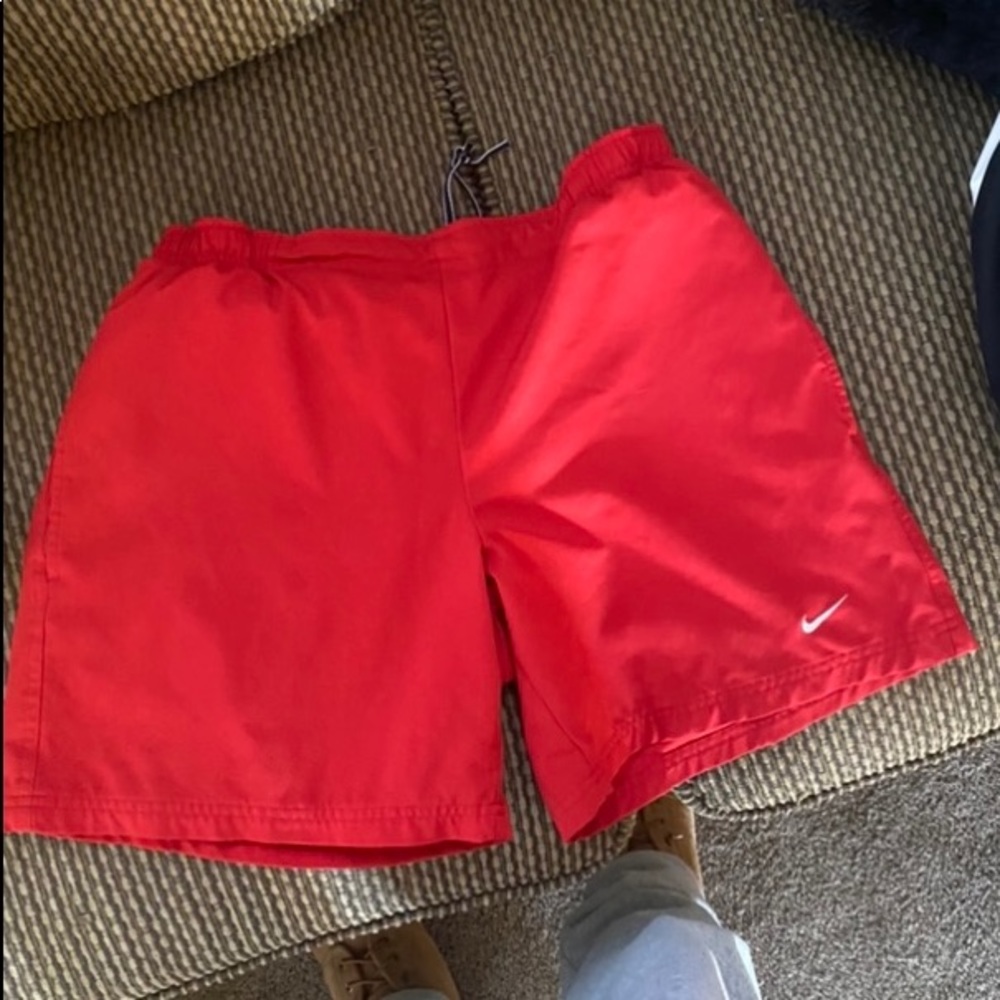 Red Nike shorts